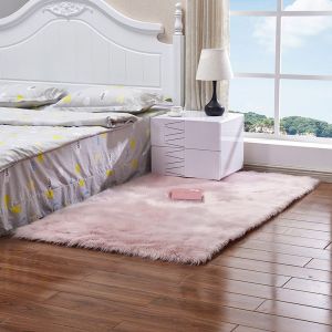 Fur faux baby pink rug