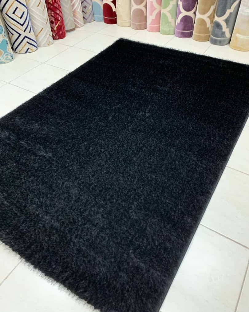 Beautiful black shaggy center rug