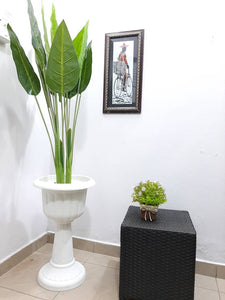 white decorative pot synthetic plant