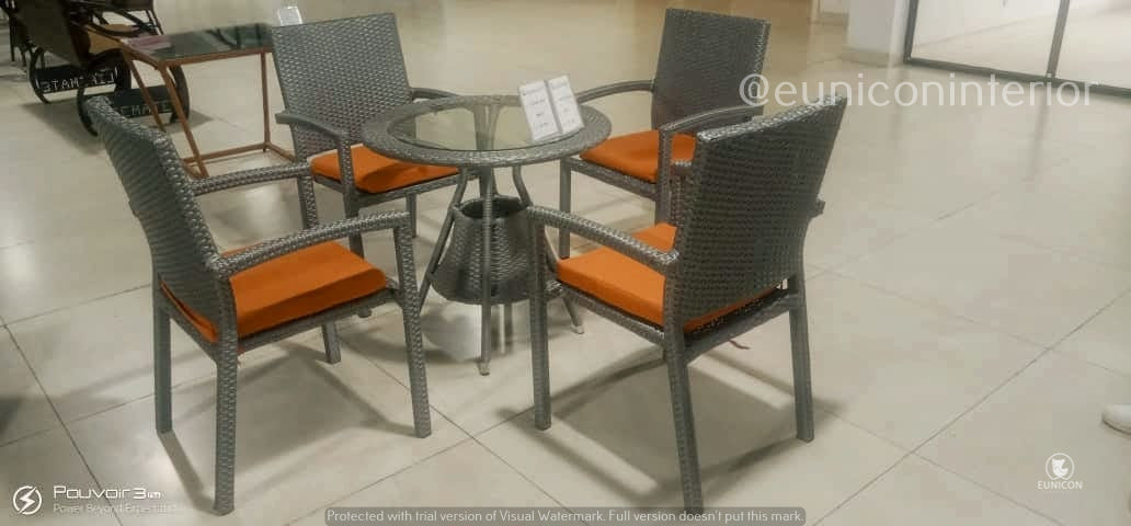 grey glass table and 4 chairs