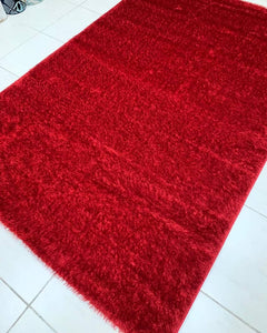 Beautiful red shaggy center rug