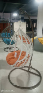 Outdoor Hanging Swing Chair with orange cushion